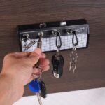 Guitarist Keychain Storage Hooks